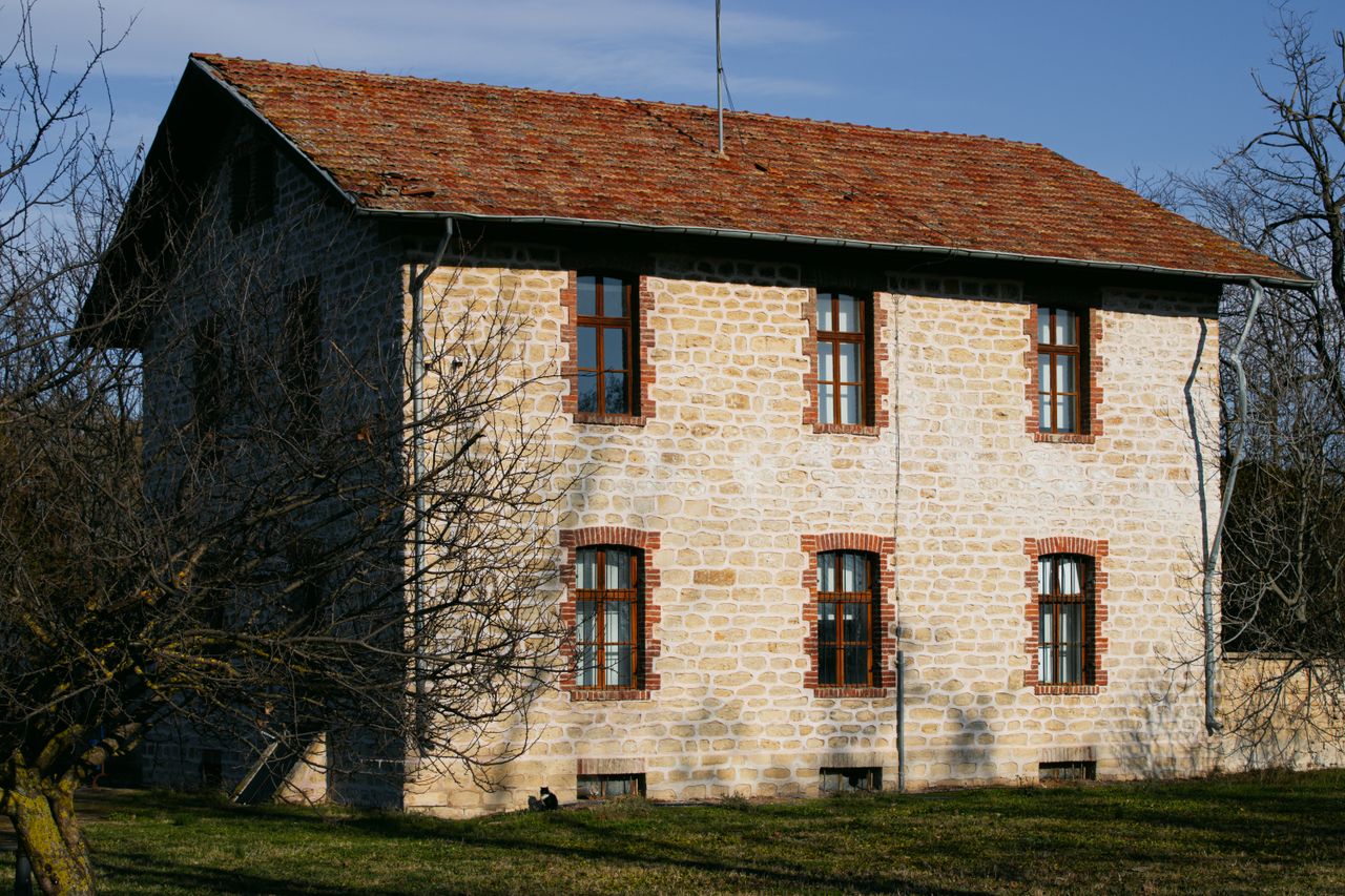menu-01 Charming old stone house in a serene Karaağaç, Edirne landscape with winter sunlight.